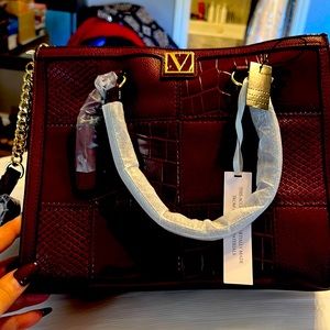 Gorgeous burgundy bag with gold bling